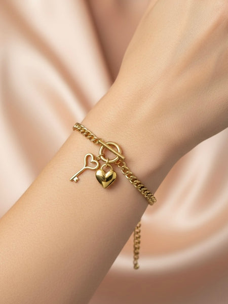 Amaura Golden Charm Link Bracelet On Hand