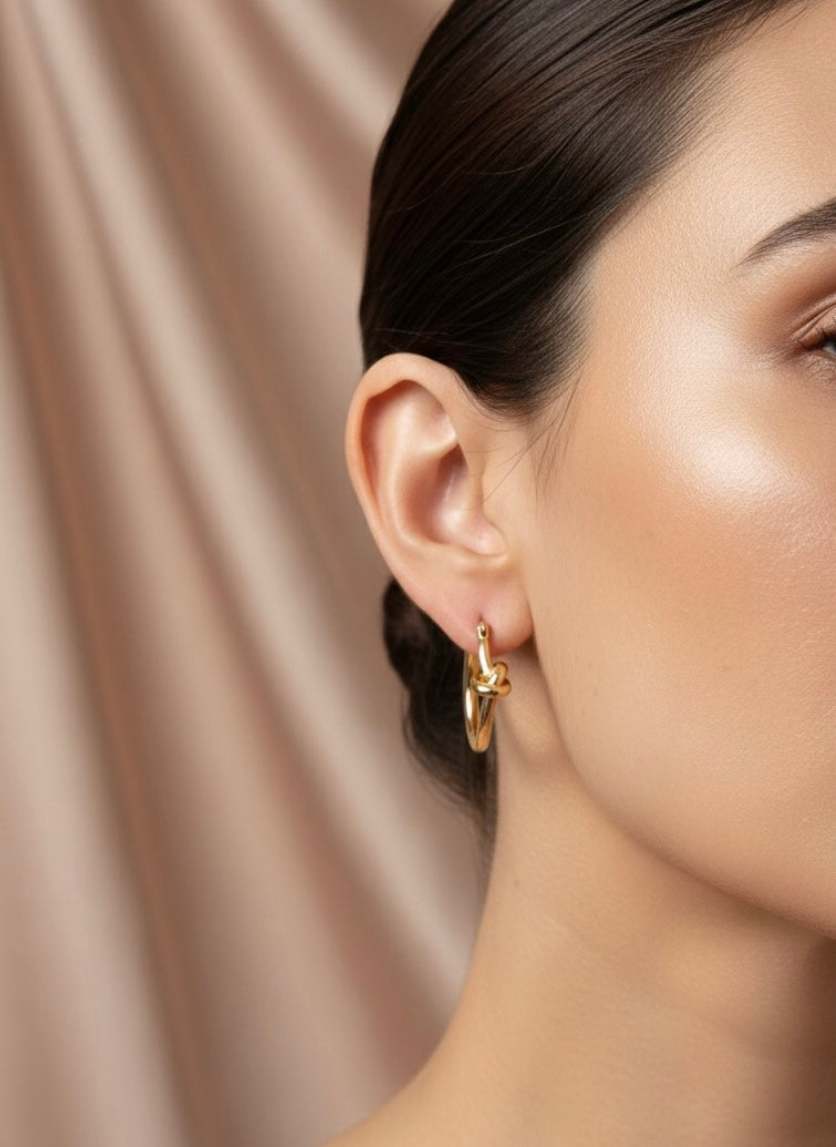 Twisted Knot Gold Hoops On Ears