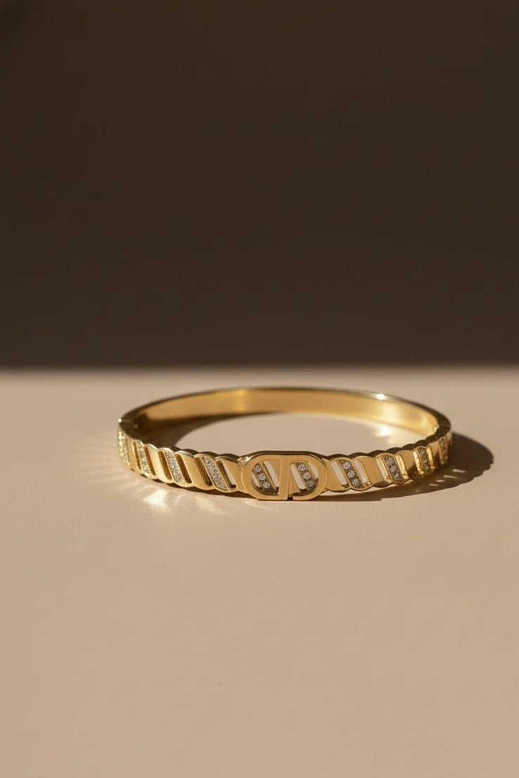 Women wearing golden kada
