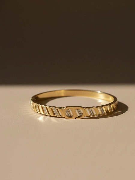 Women wearing golden kada
