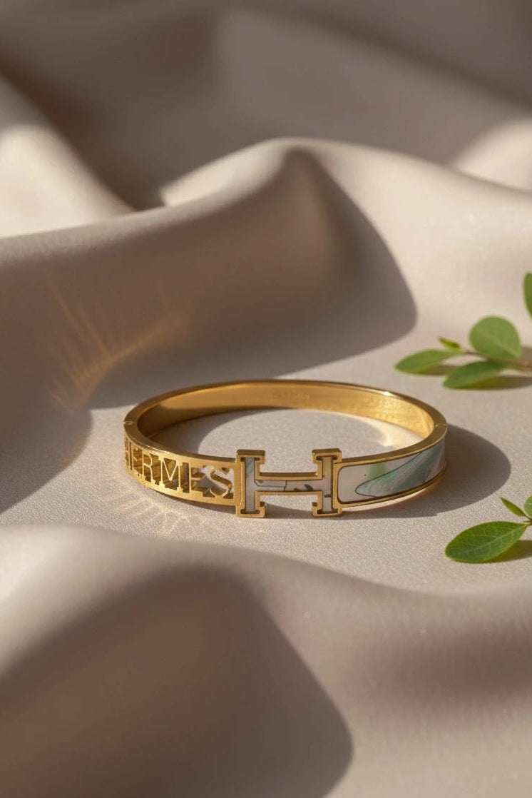 Modern gold and green kada