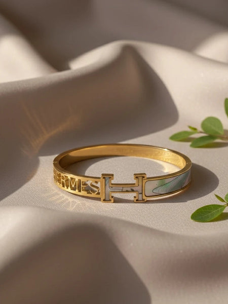 Modern gold and green kada