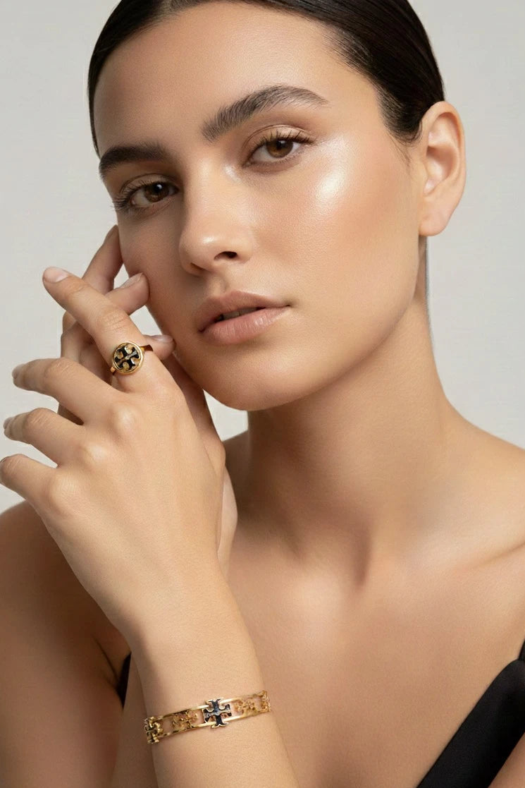 Modern golden kada with black accents
