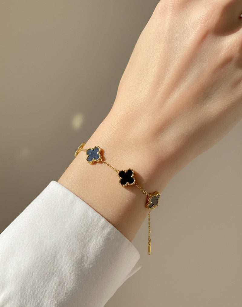 Amaura Noir Clover Charm Bracelet On Hand