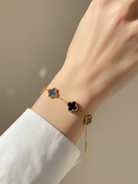Amaura Noir Clover Charm Bracelet On Hand